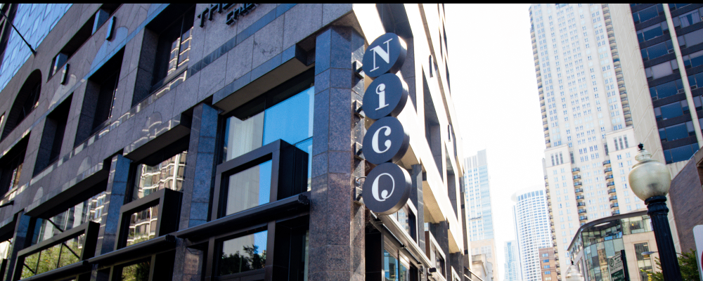 A building with the word Nico on the side.