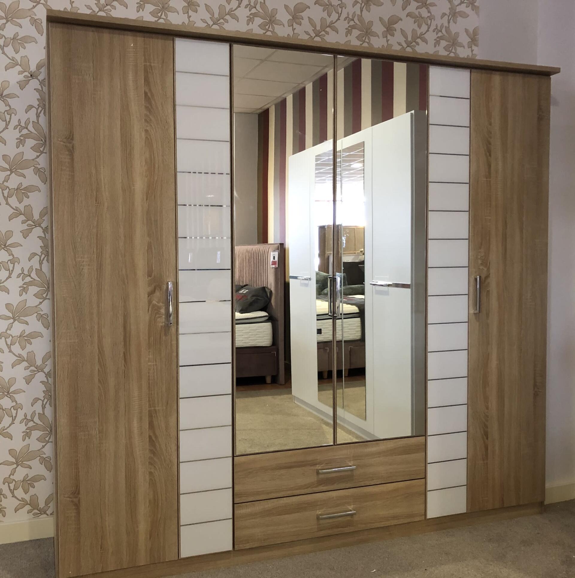 Mirrored double wardrobe assembled in bedroom