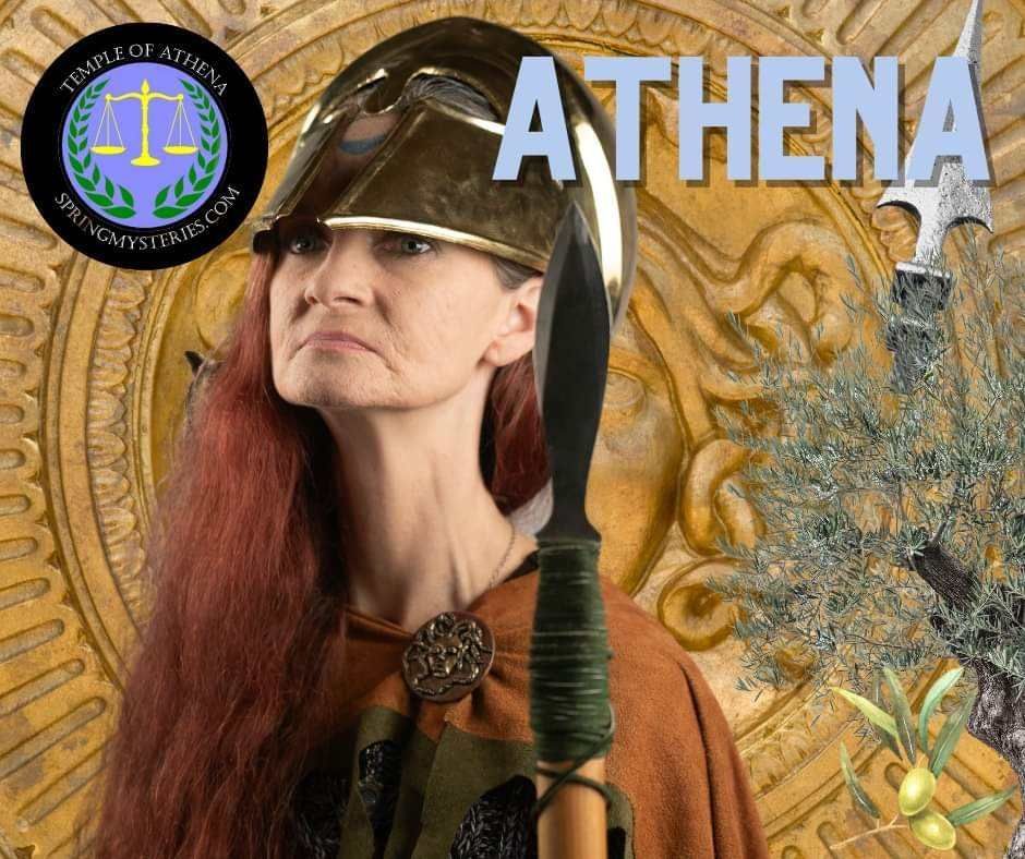 A woman is dressed as the goddess athena