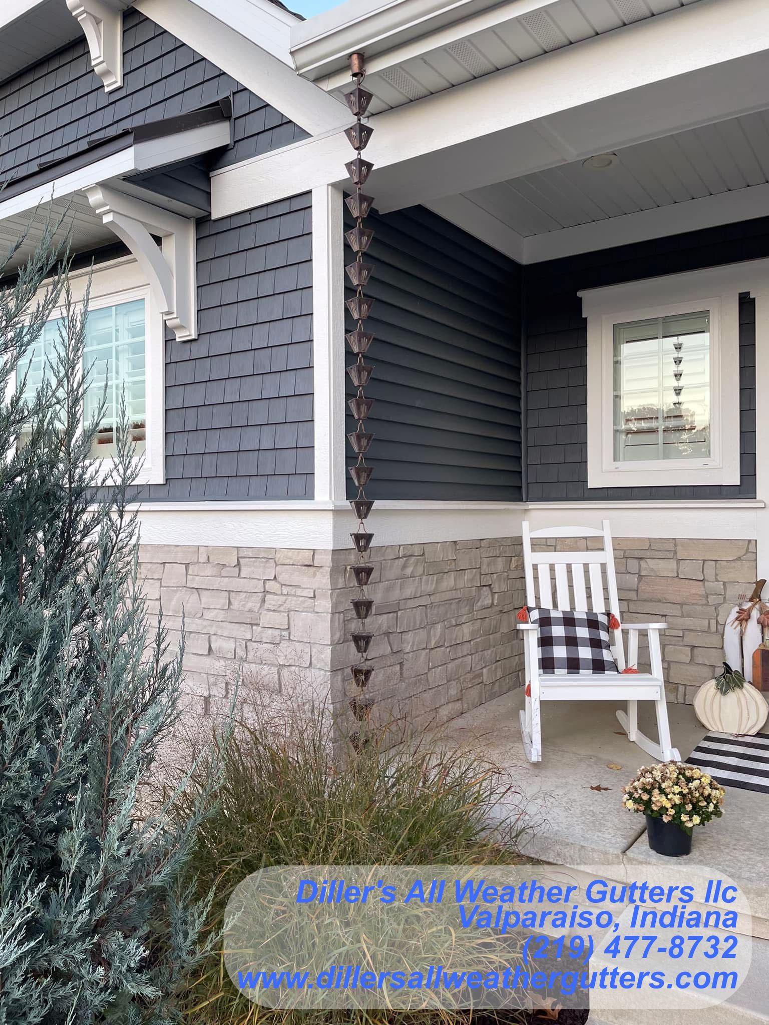 There is a rocking chair on the porch of a house.