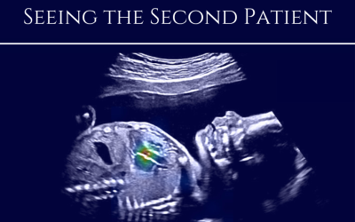A poster for seeing the second patient shows an ultrasound of a skull