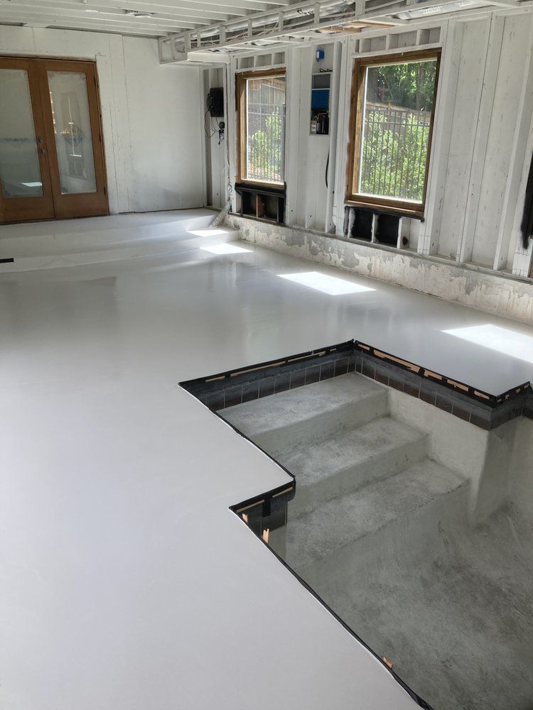 There is a hole in the floor in the middle of the room.