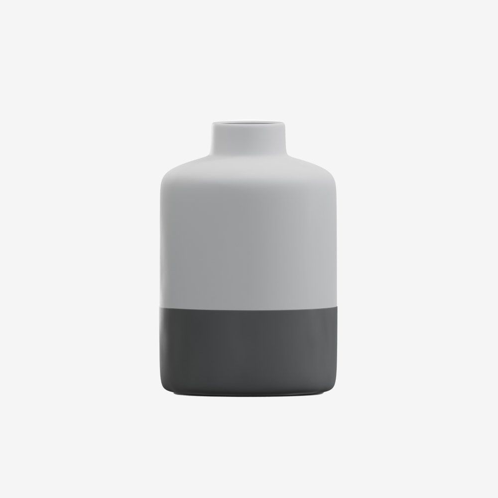 A white vase with a black base on a white background.