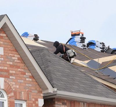 Roofing Expert — Worker Repairing of New Roof in Lexington, SC
