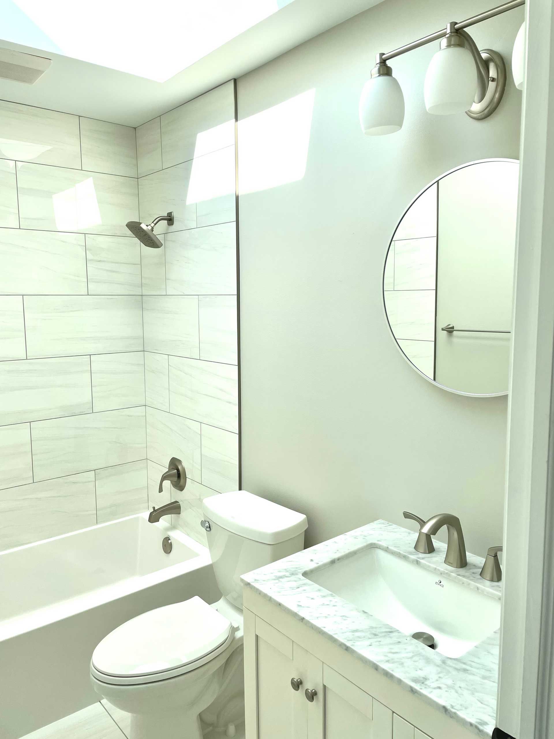White Bathroom With A Toilet - Oswego, IL - New Bath LLC