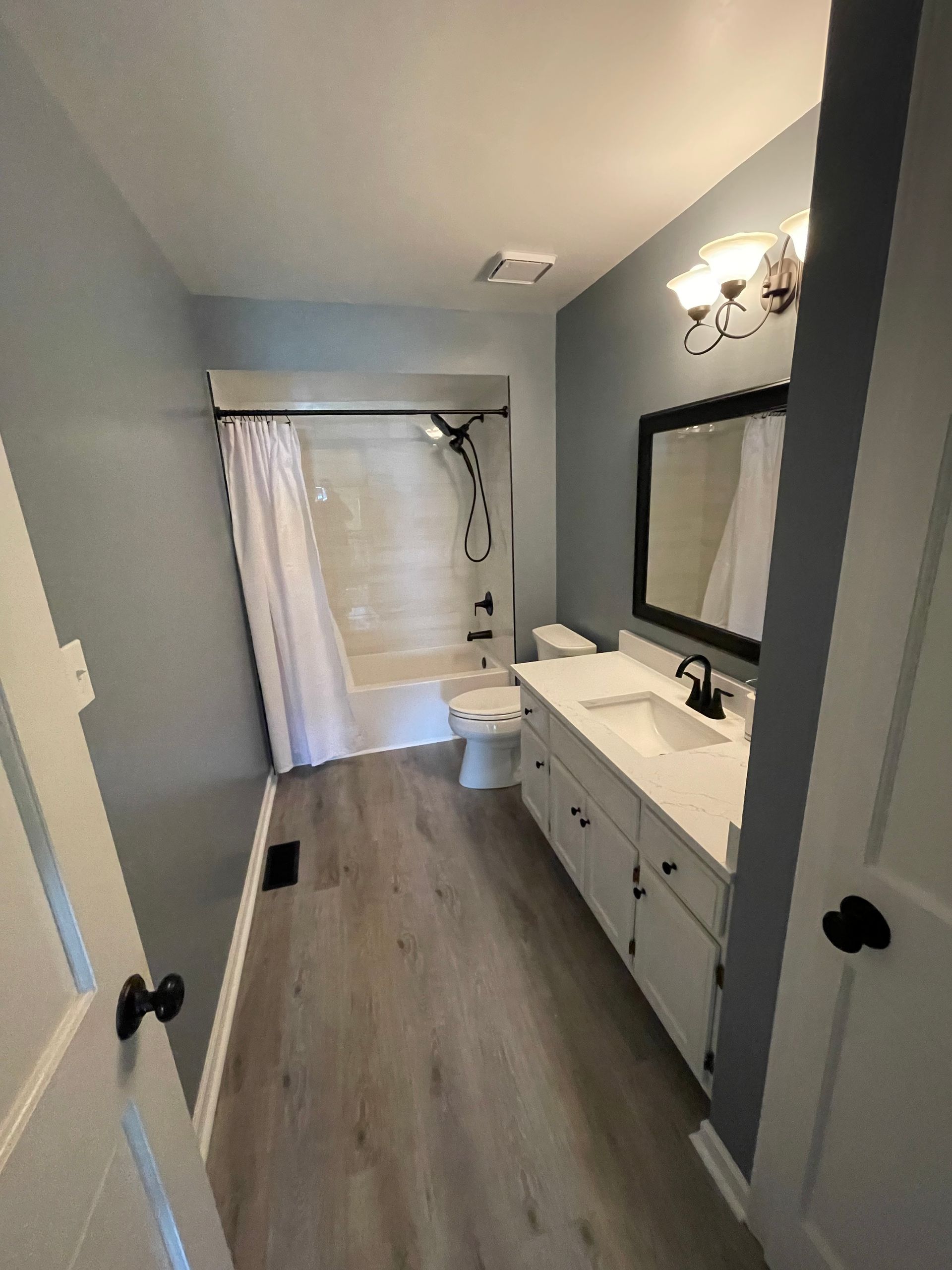 A View of a Modern Bathroom from the Outside - Oswego, IL - New Bath LLC