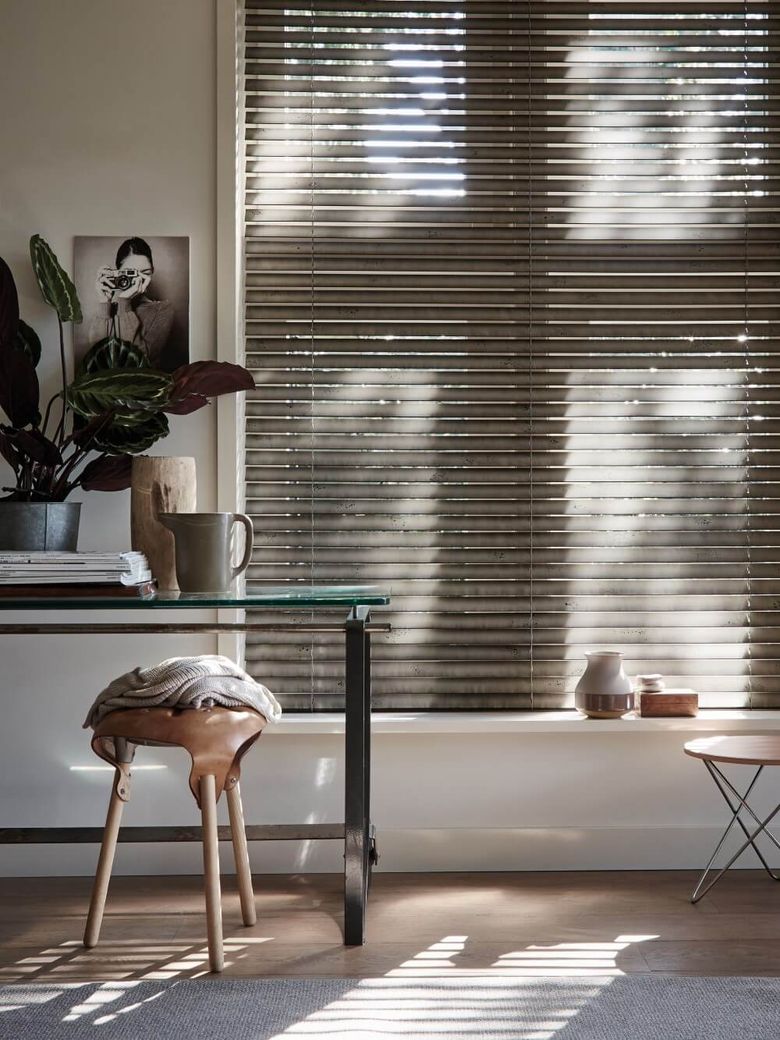 grey shutters open with natural light coming in
