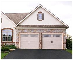 Beautiful House With Garage Doors — Cumberland, RI — Woonsocket Door Sales