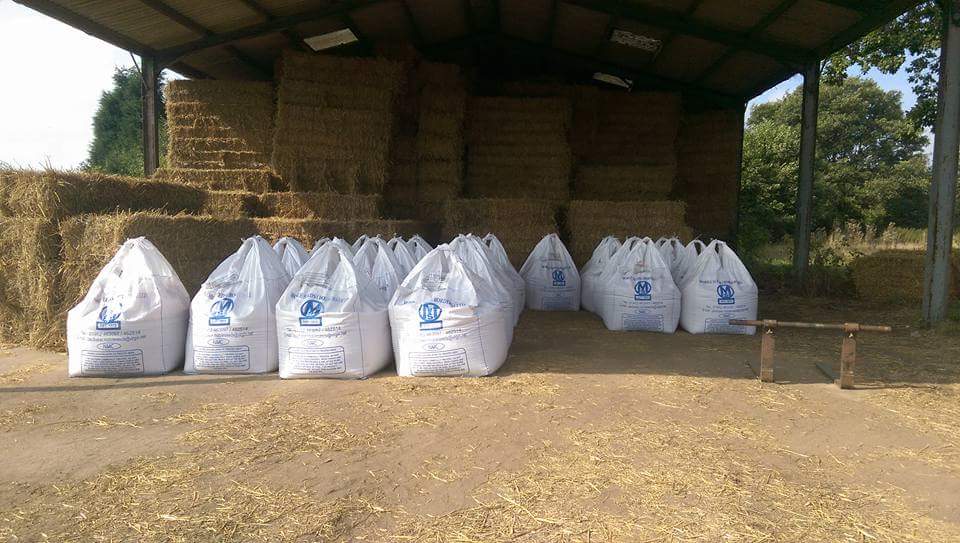 Bags of seed and bails of hay