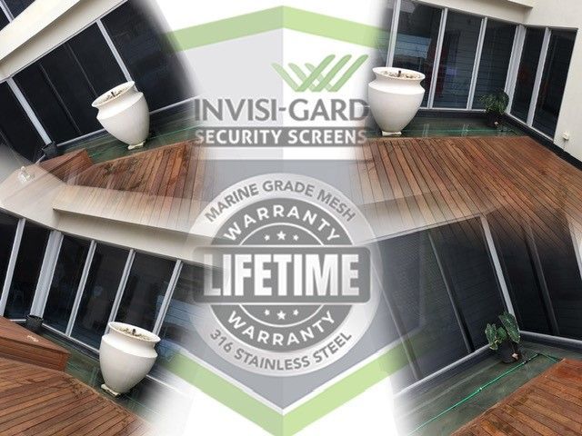 Composite of a house exterior with Invisi-Gard security screens installed
