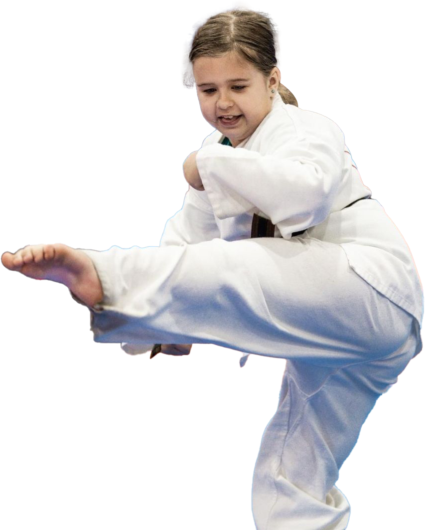 A young girl is practicing karate on a white background.