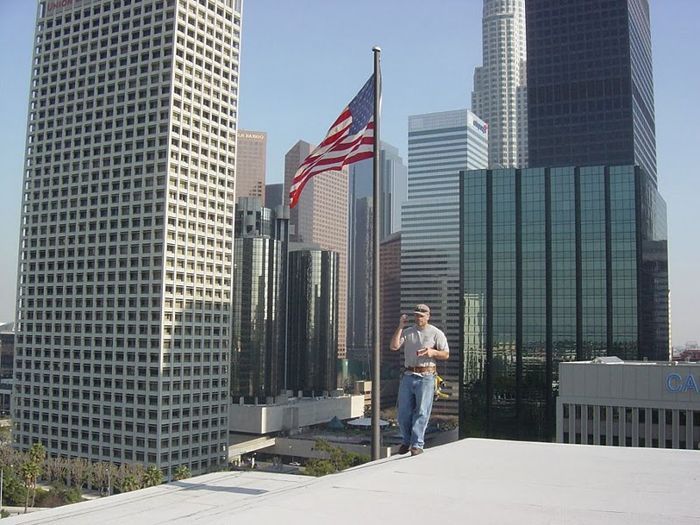 worker installing a gutter