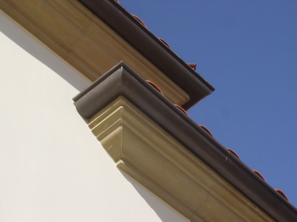 worker installing a gutter