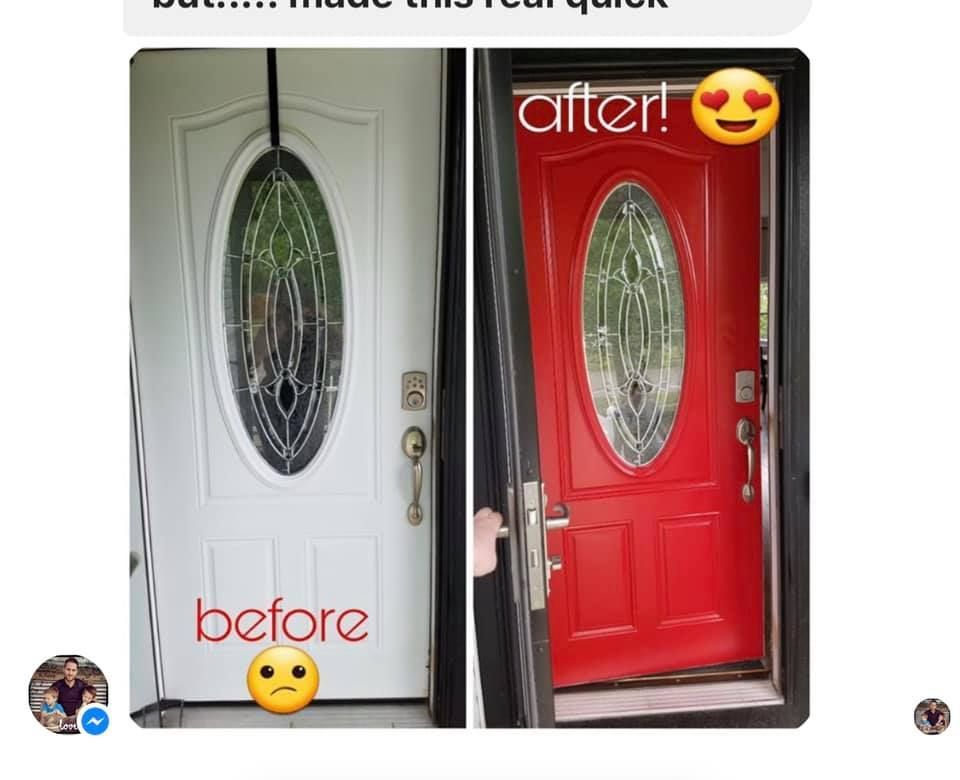 A man on a ladder is painting the side of a house.