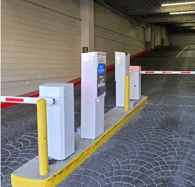 Parking BOXX parking management system installation with paver walkway and branded pay station