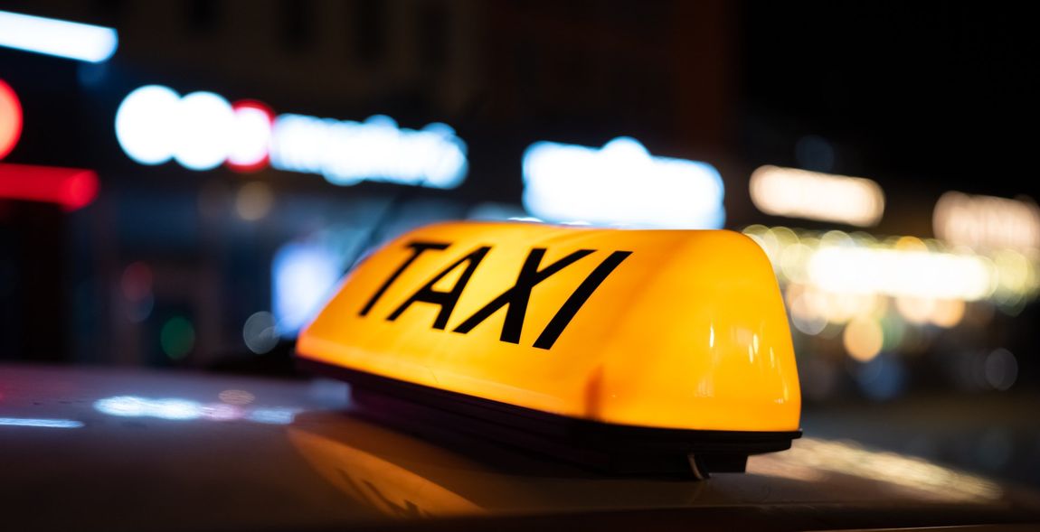 taxi light above the car