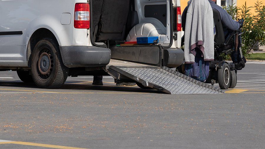 wheelchair beside the taxi