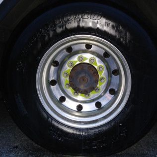 A close up of a truck wheel with a tire on it.