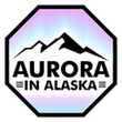 The logo for aurora in alaska is a stop sign with a mountain in the background.