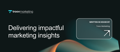 Website banner with teal gradient: “Website Design Cost 2025: What Small Business Owners Actually Pay” and a button