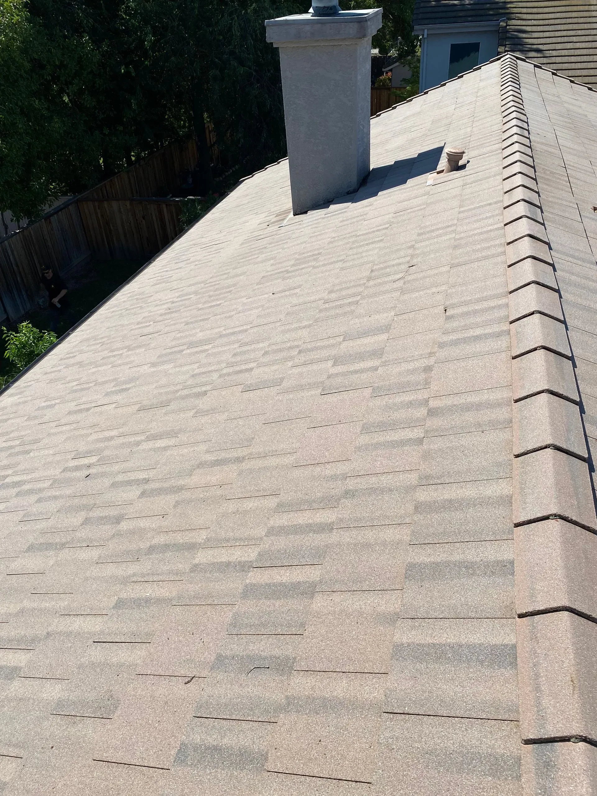 A roof with a chimney on top of it.