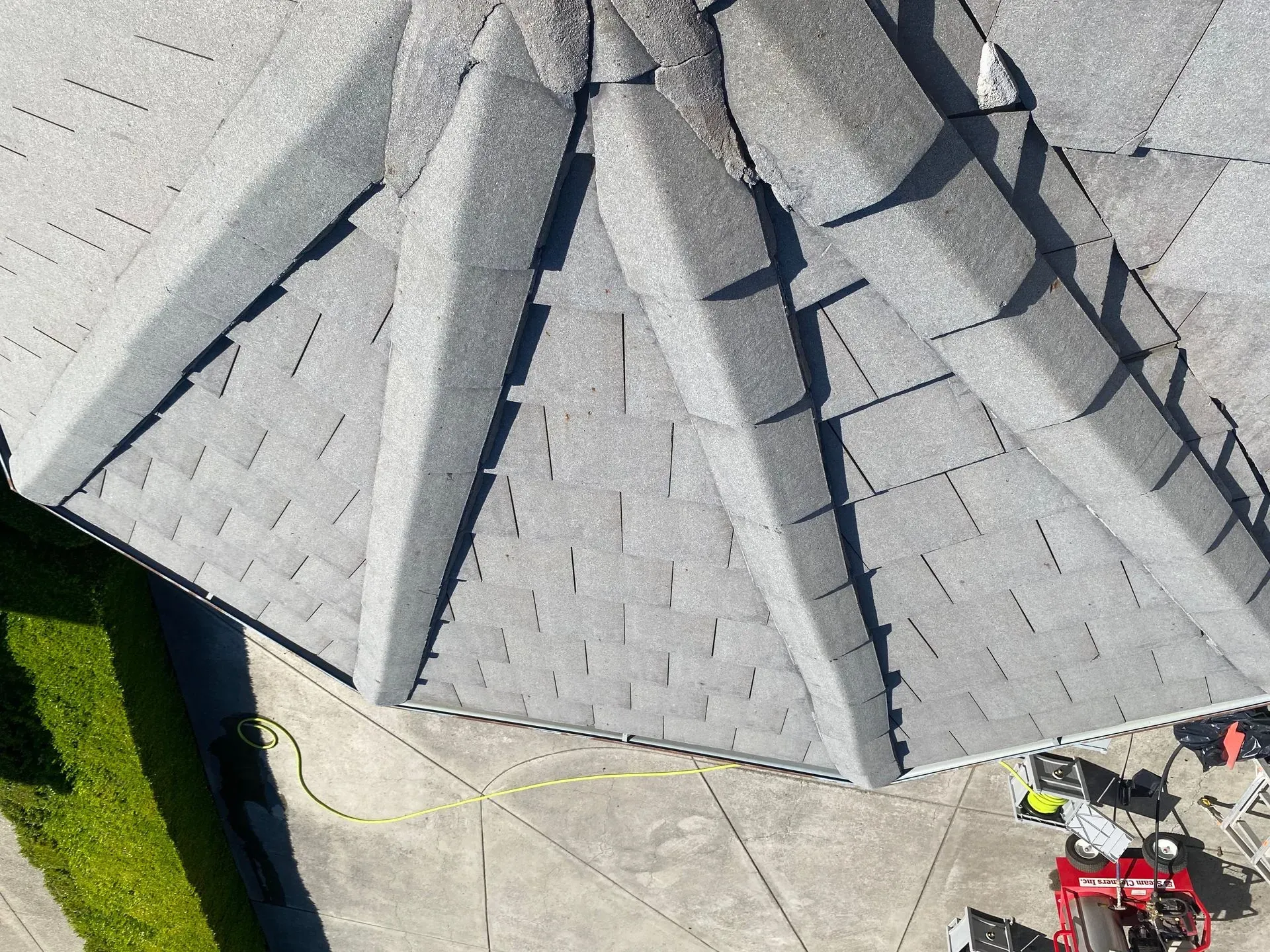 An aerial view of a building with a pyramid shaped roof