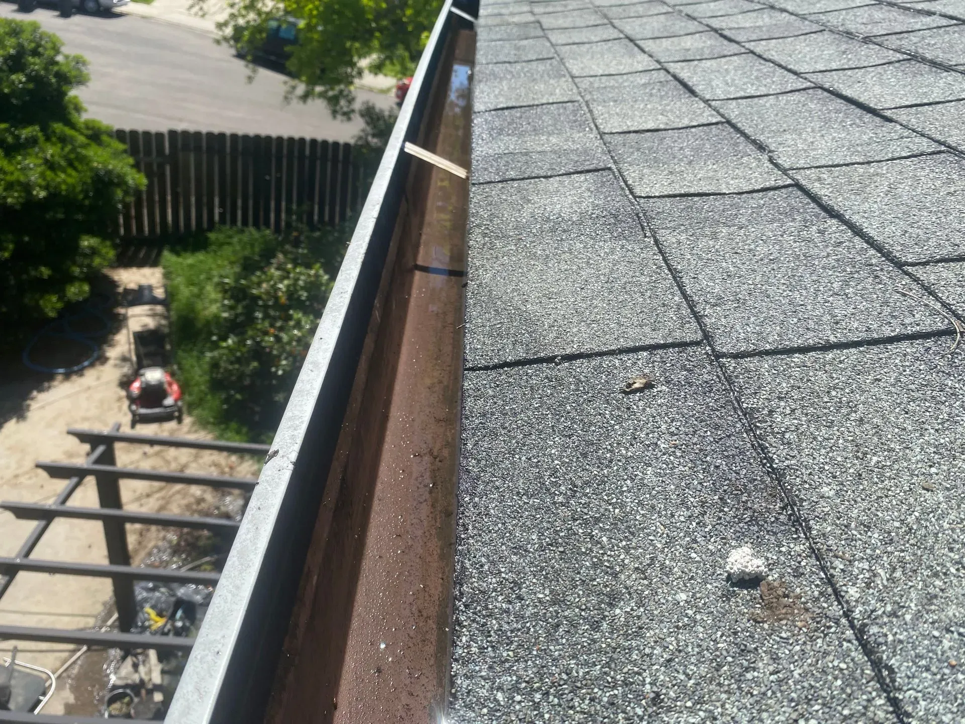A close up of a gutter on a roof