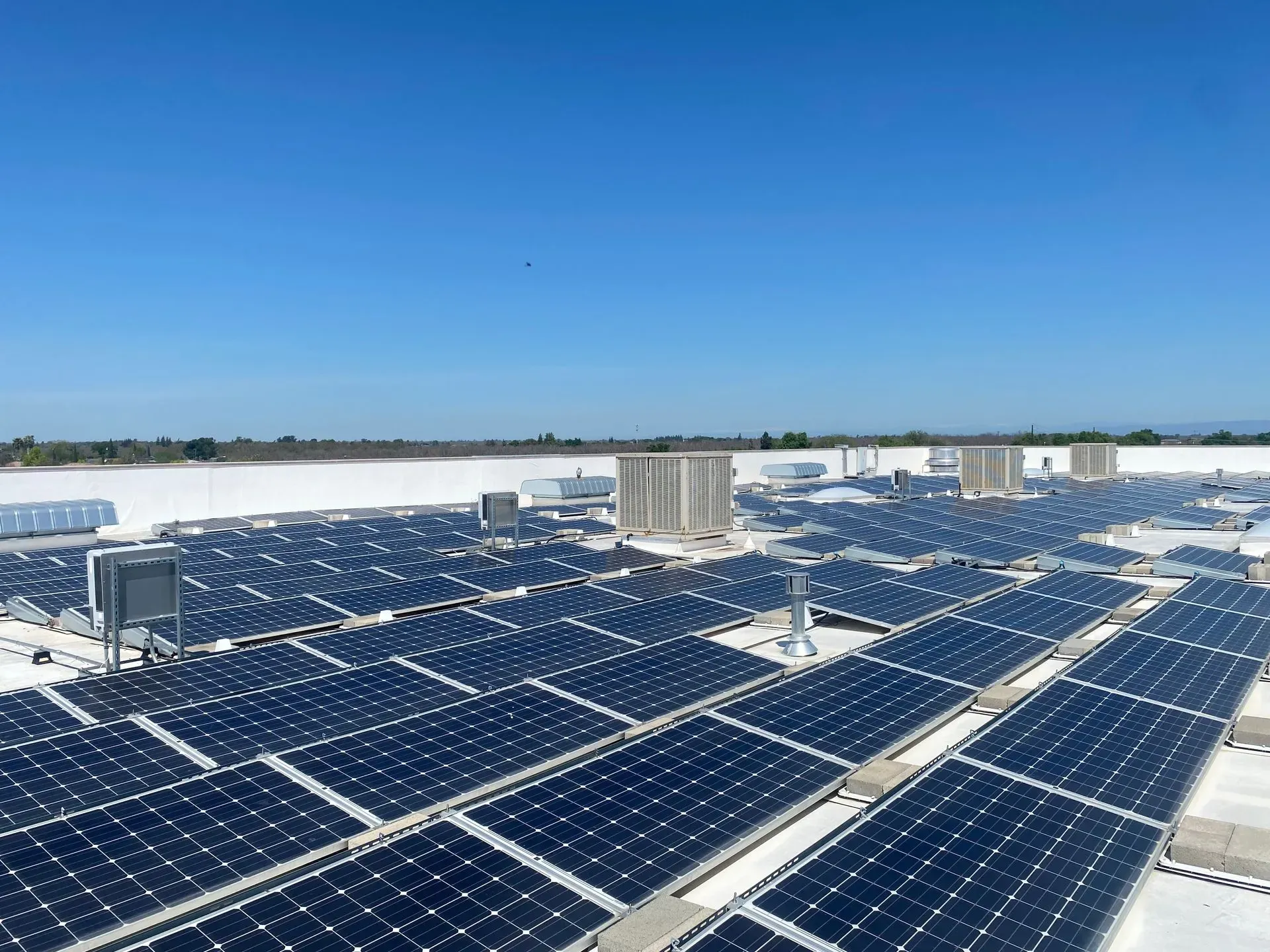 A roof with a lot of solar panels on it
