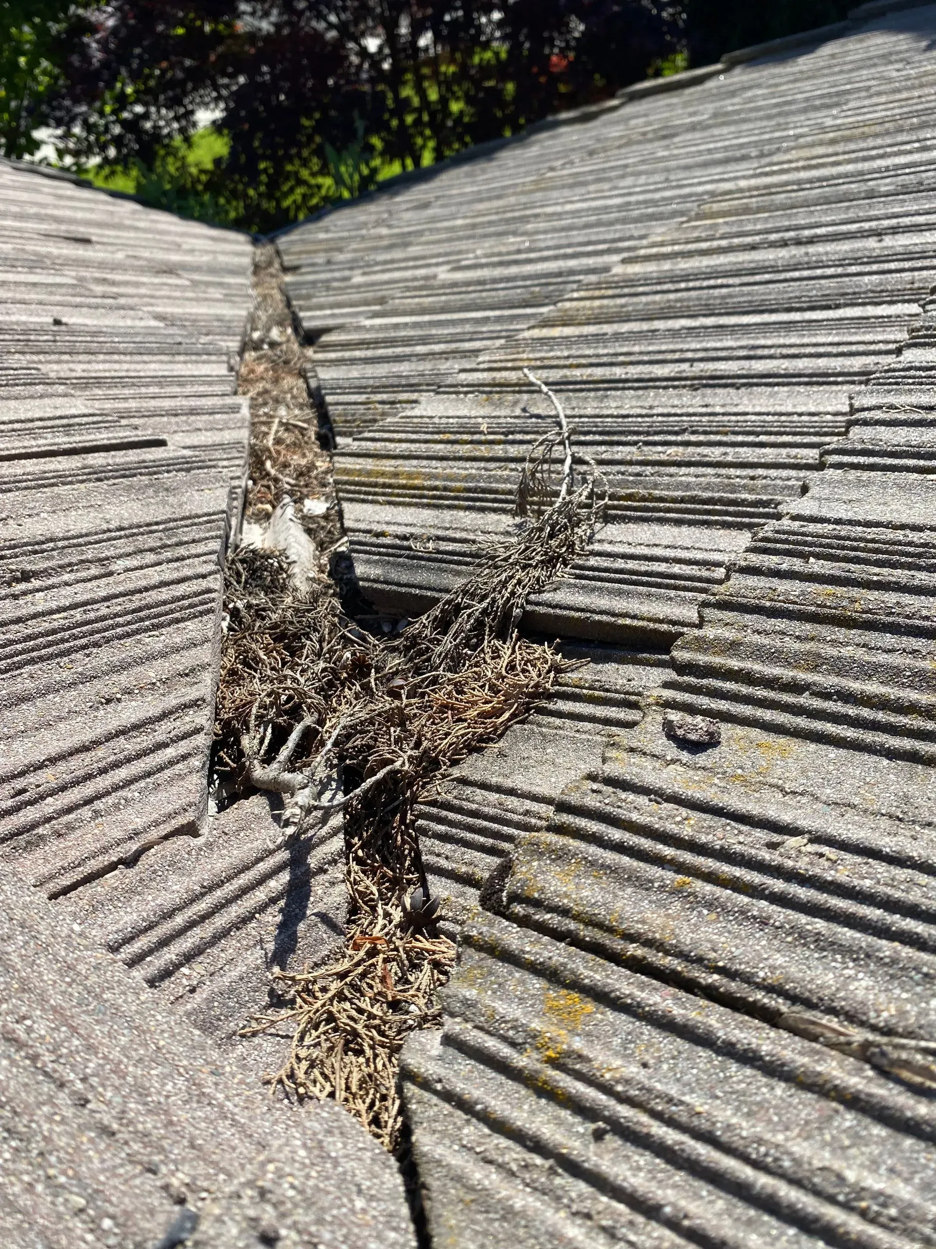 A close up of a roof with a hole in it.