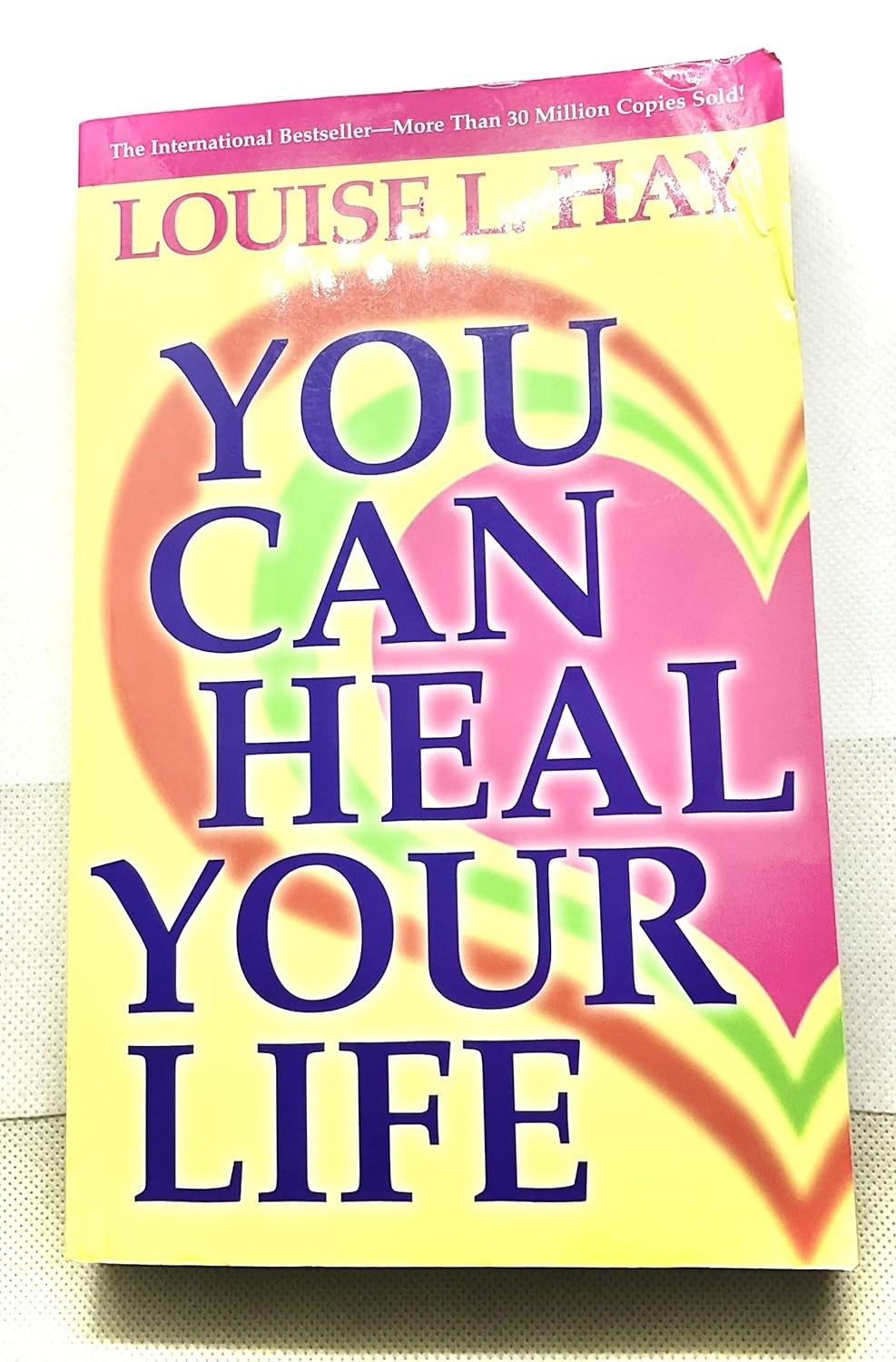 A book by louise hay titled you can heal your life