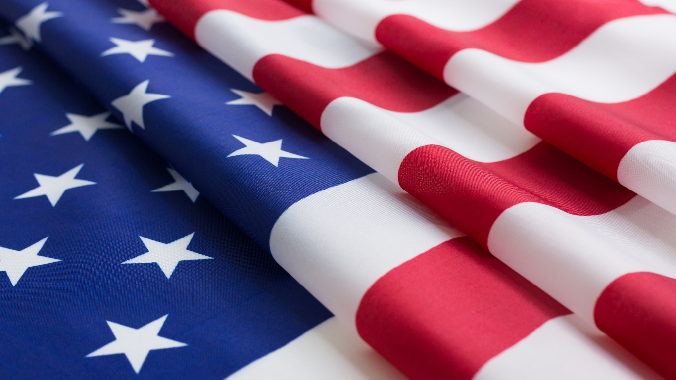 A close up of an american flag with stars on it