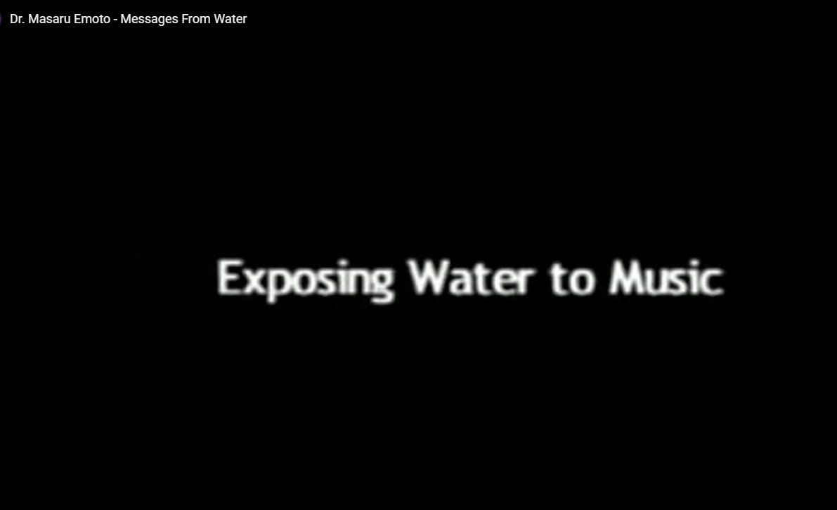 A black background with white text that says exposing water to music