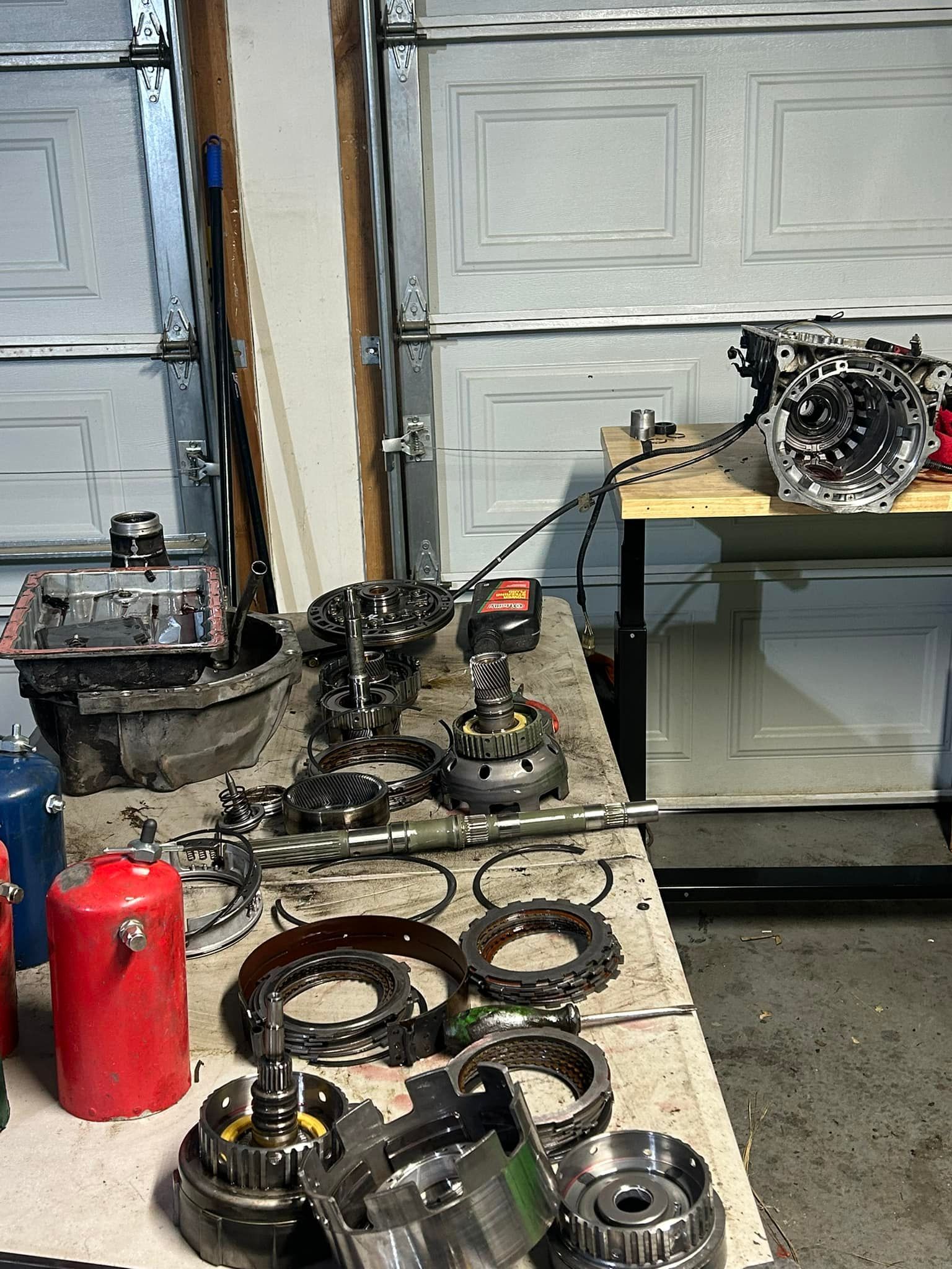 Transmission Components Disassembled On Workbench | Double D Automotive
