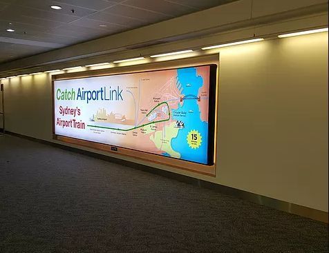 Airport LED lightbox mounted on a wall