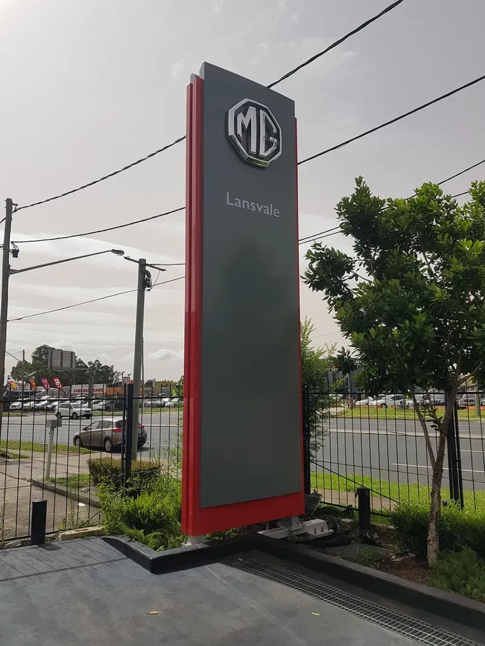 Pylon, road sign, business sign