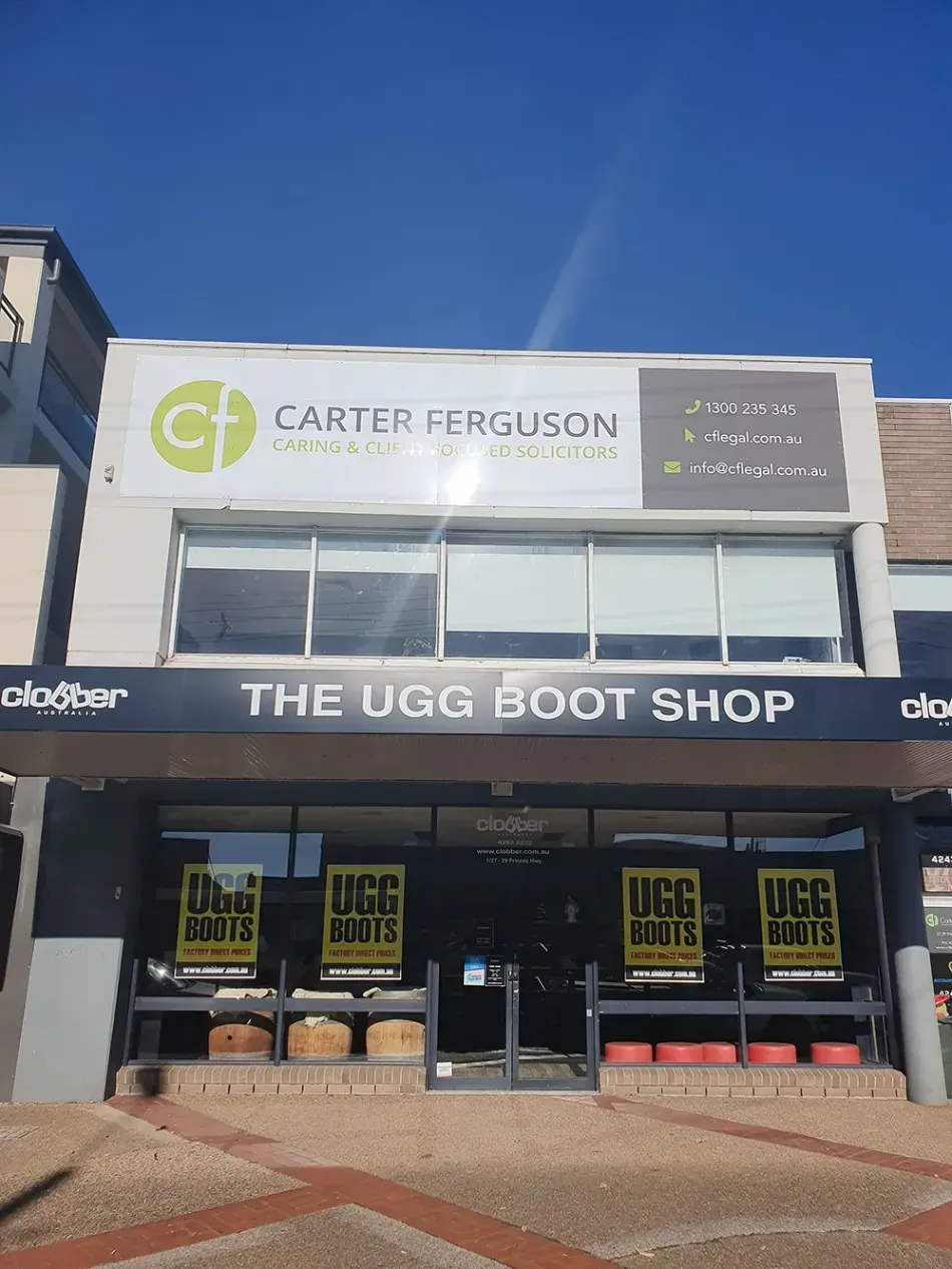 outdoor shop sign for a building