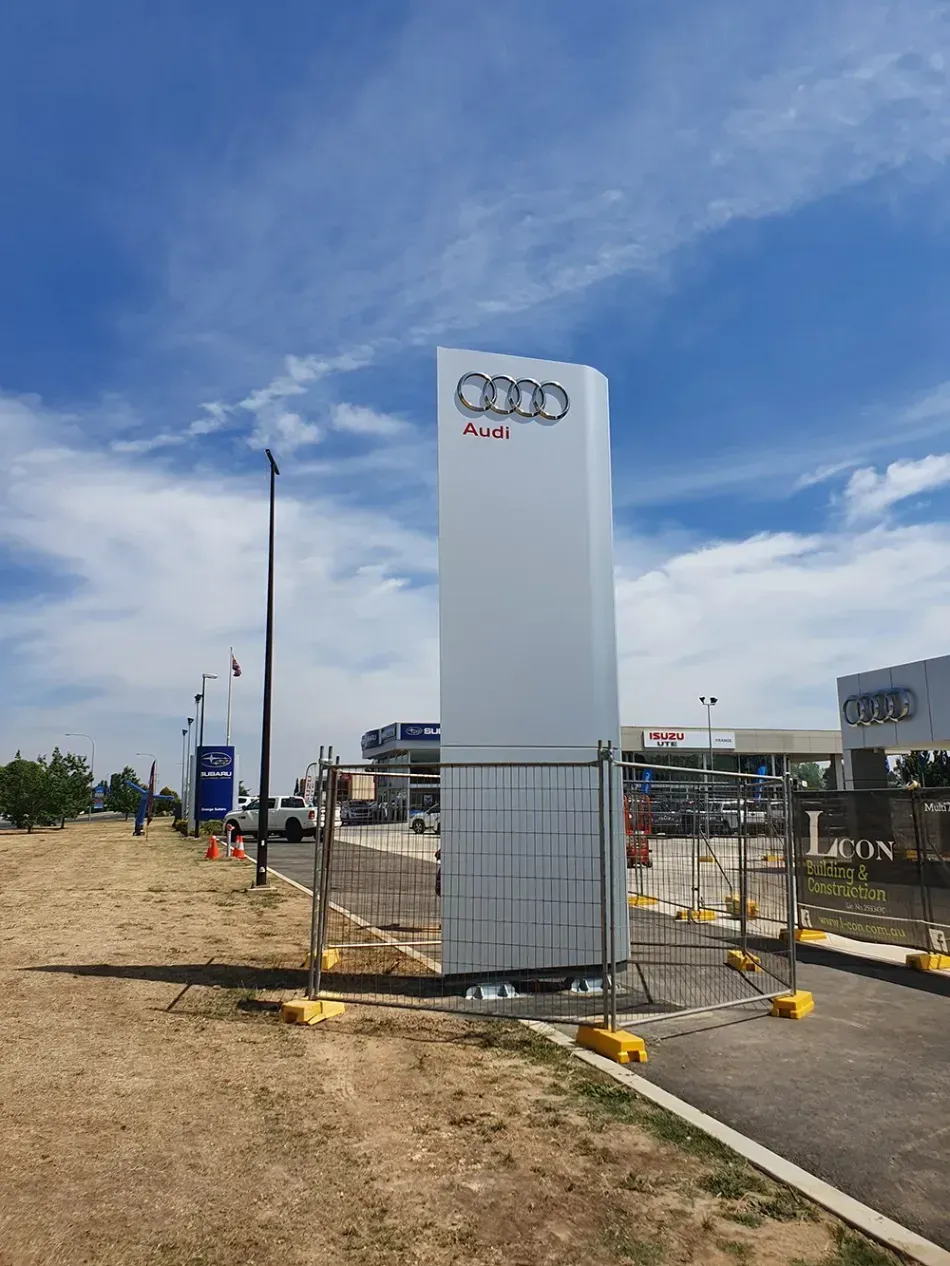 Metal lettering pylon sign