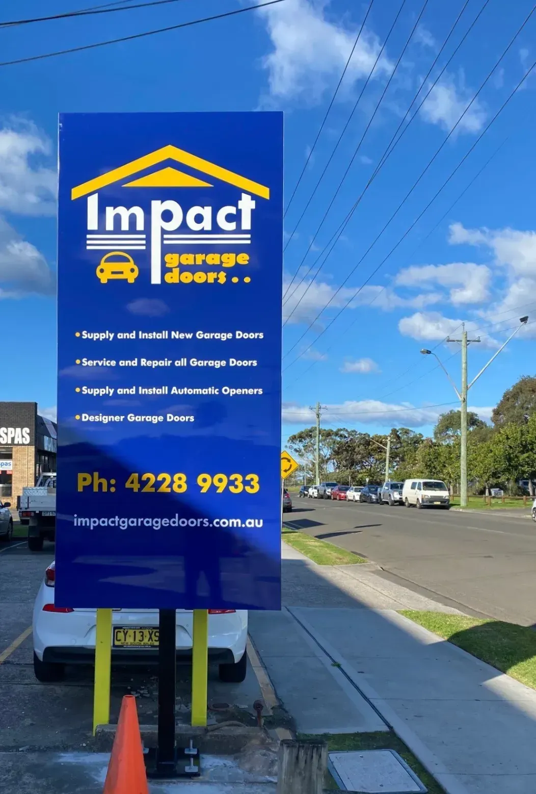 Impact Garage Doors roadside signage