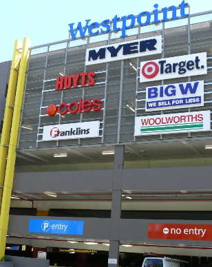 a collection of signage for different businesses