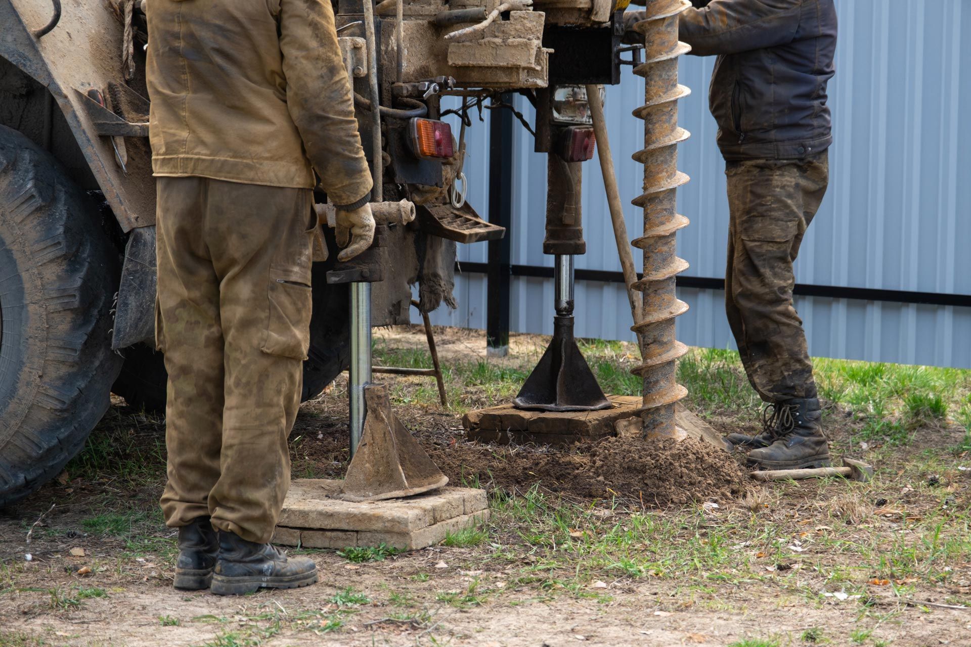 Professional well drilling contractor performing ground drilling for water well installation. Professional well drilling contractor performing ground drilling for water well installation.