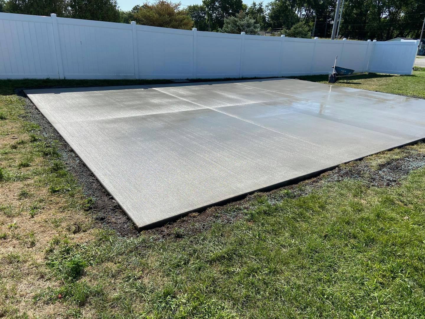 Concrete outdoor steps leading up to a building entrance.