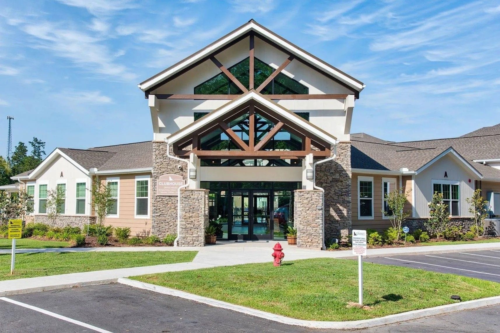 Front exterior of Waypoint at Hammond showing entrance and landscaping.