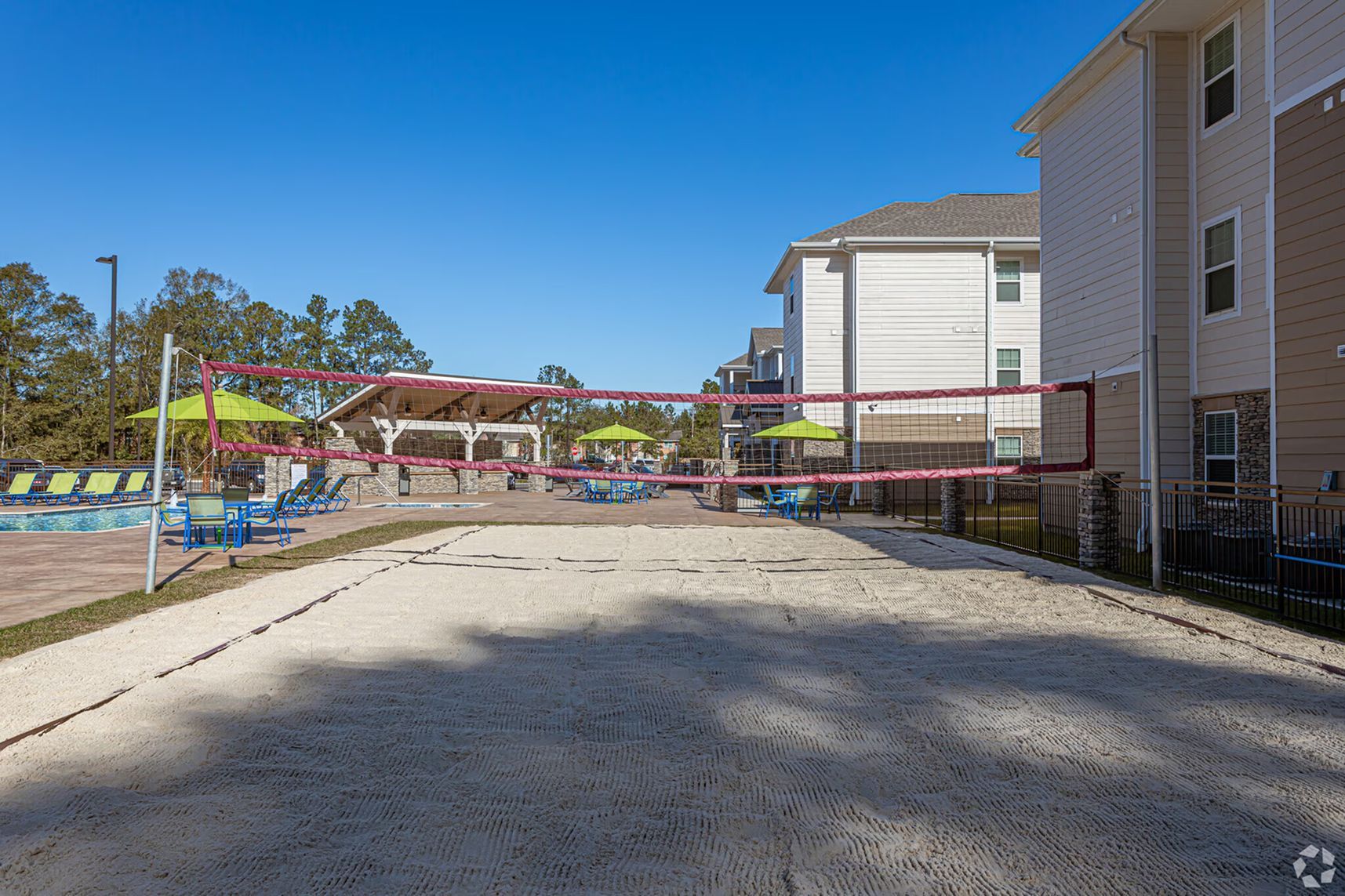 Community outdoor view showing apartment buildings and shared spaces at Waypoint at Hammond.