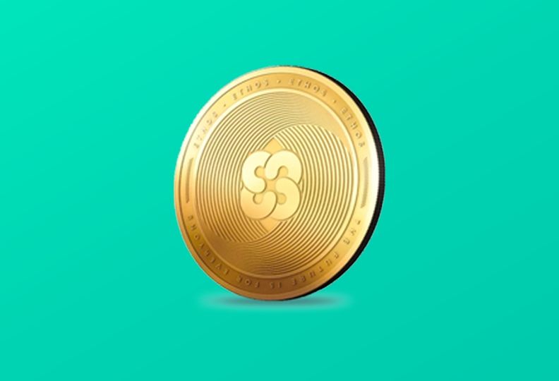 A gold coin with a symbol on it is on a green background.