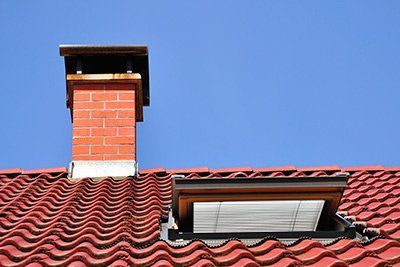 woman enjoying a roaring fireplace woman enjoying a roaring fireplace