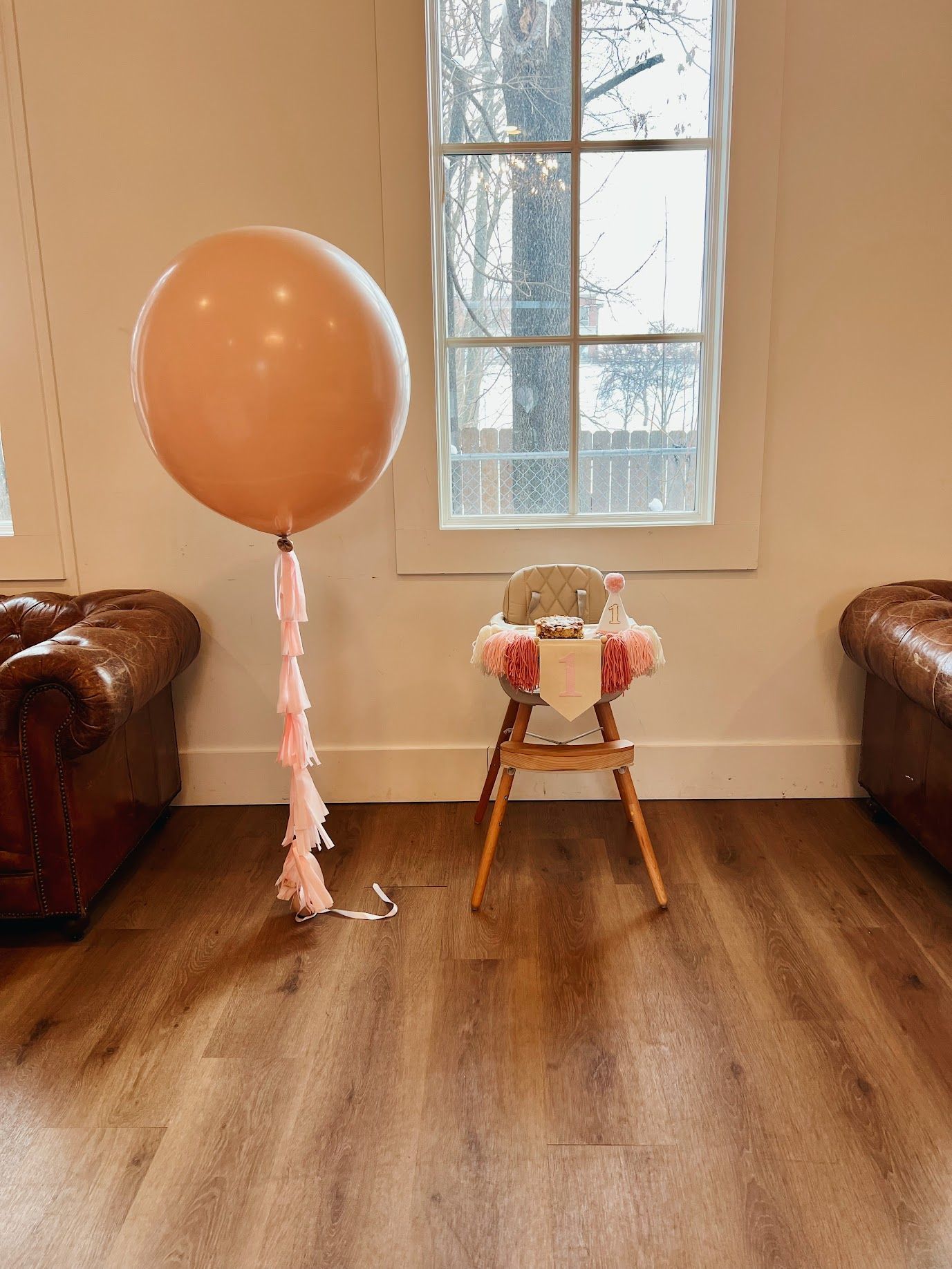 Nicole Boyd with Party Balloon Studio showing a jumbo balloon with  fringe tassel 