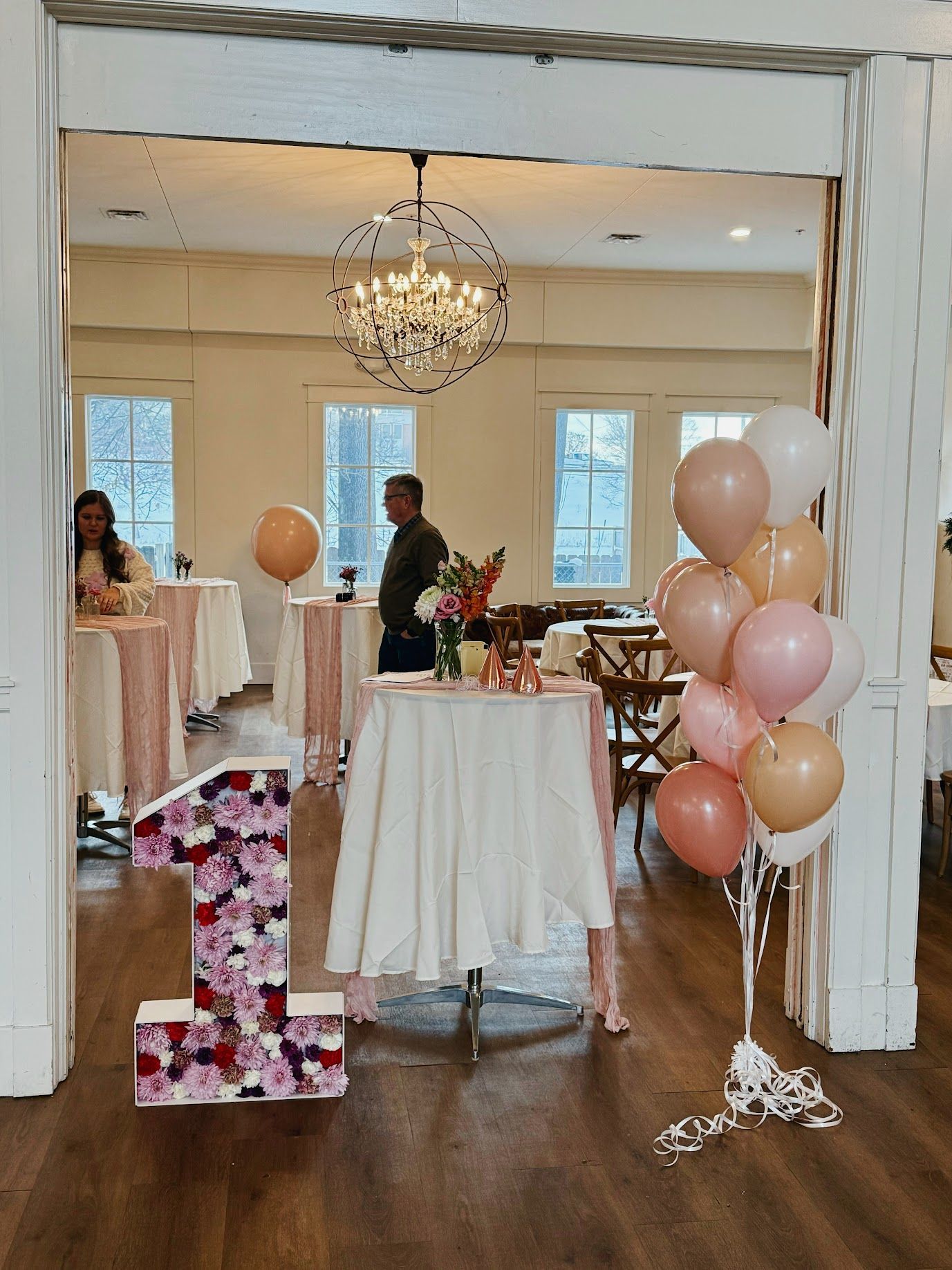 Nicole Boyd with Party Balloon Studio showing a dozen of balloon bouquets