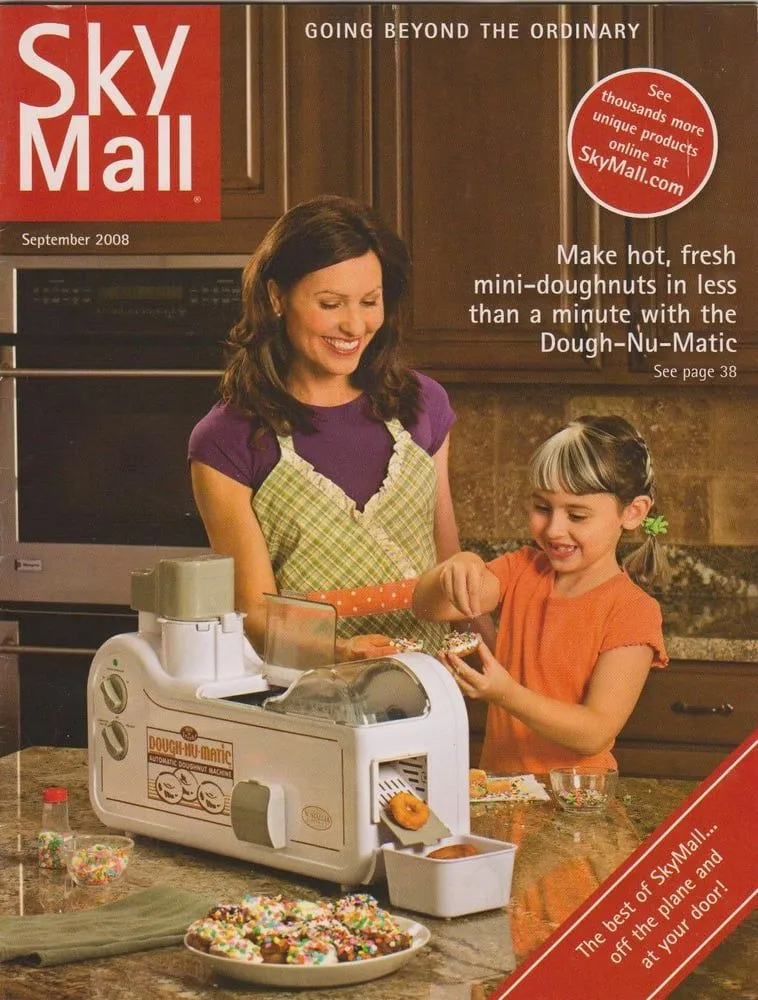 Mother and Her Daughter Using a Donut Maker