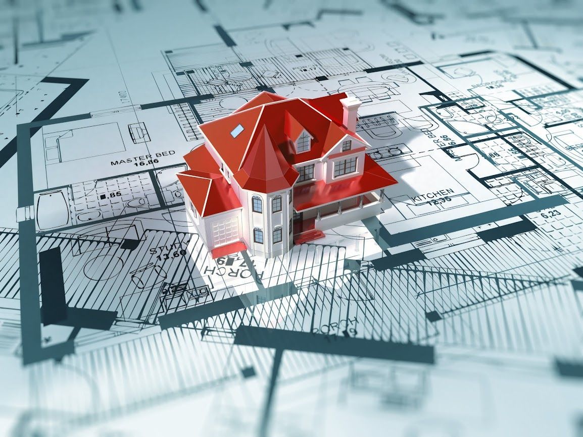 Modello di casa con tetto rosso