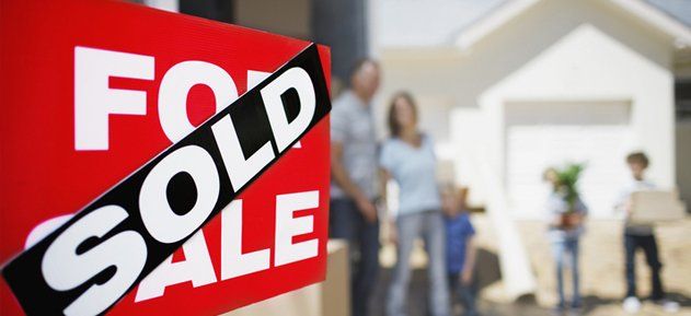 property with for sale sign